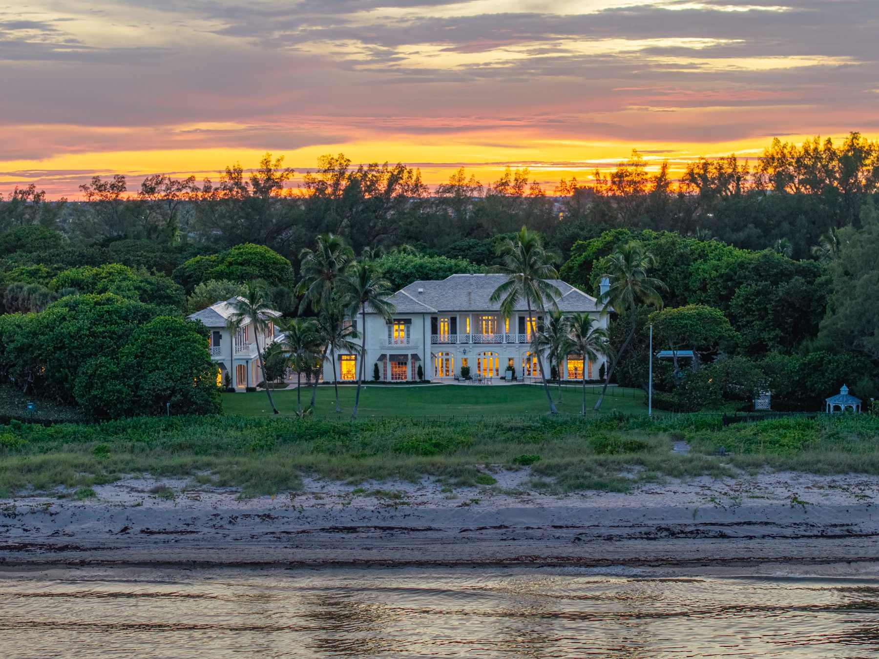 1919 N Ocean Boulevard, Gulf Stream, an oceanfront estate at sunset