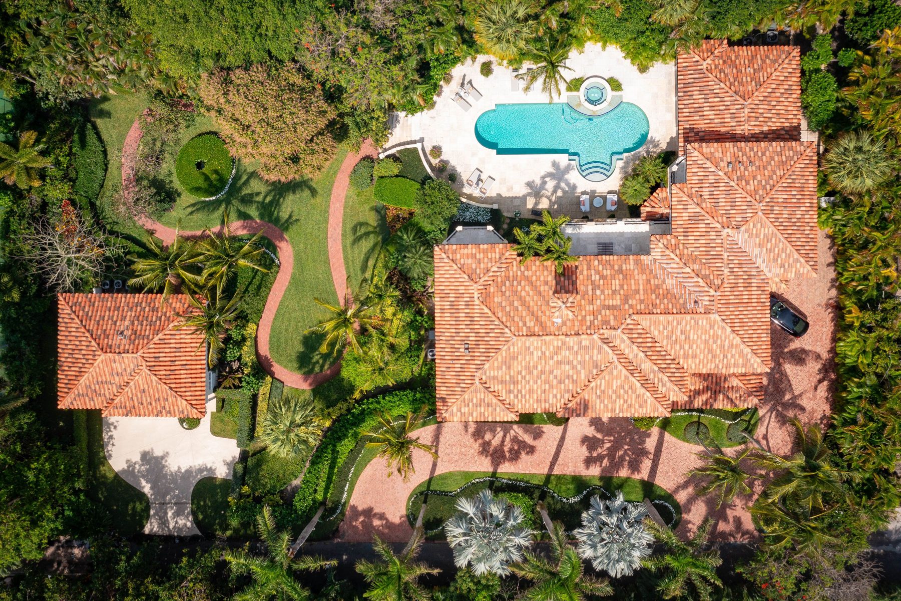 5 Via Sunny, Palm Beach, aerial view of the tile roofs and pool